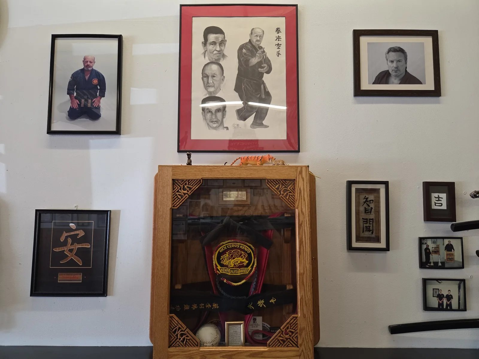 Nick Cerio lineage display and historical martial arts memorabilia inside Zanshin